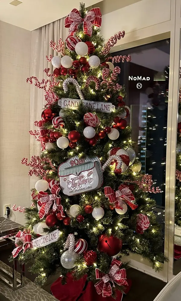 Candy cane themed Christmas tree in a hotel suite